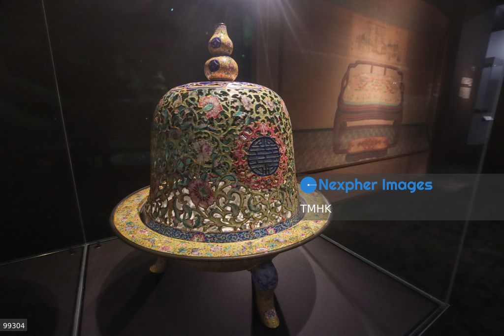 A close-up view shows a masterpiece crafted by the Qing Imperial Workshops on display inside a showcase at the "Design for the Forbidden City: Imperial Workshops of the Qing Court" exhibition at the Hong Kong Palace Museum on September 29, 2026 in Hong Kong. The exhibition explores traditional craftsmanship, material innovations, and court design aesthetics from the Qing dynasty. (Photo by Gordon Choi/TMHK via Nexpher Images)