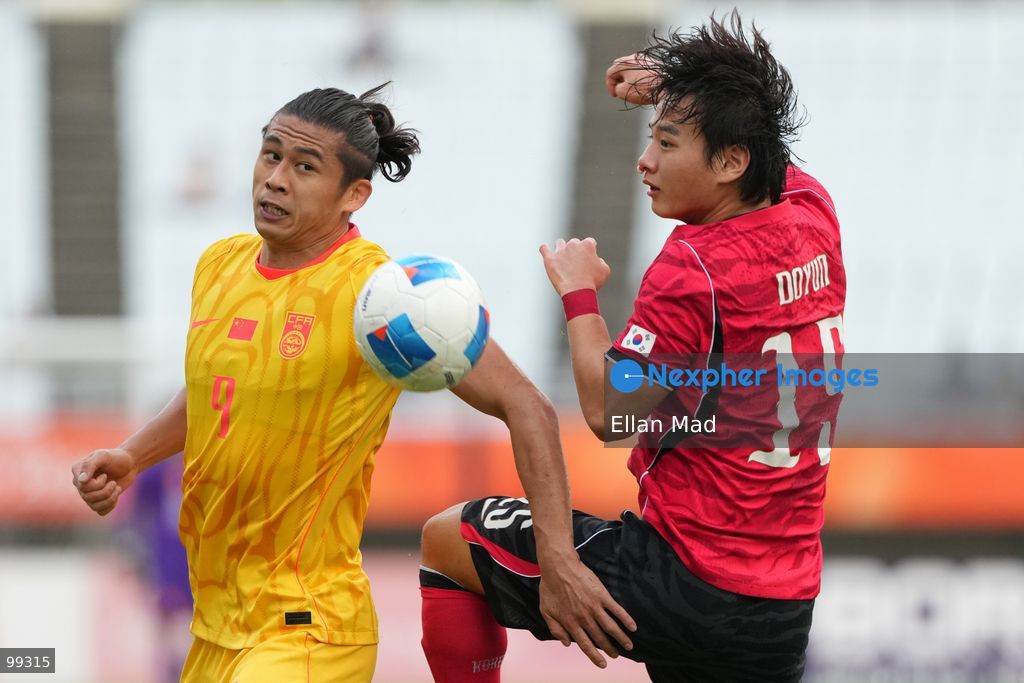 South Korean Footballer Park Seung-soo and chinese footballer Zhang Yuning during a football match between South Korea and China at the 2026 asia games on September 30, 2026 in Nagai Stadium, Osaka, Japan (Photo by Ellan Mad/Nexpher Images)