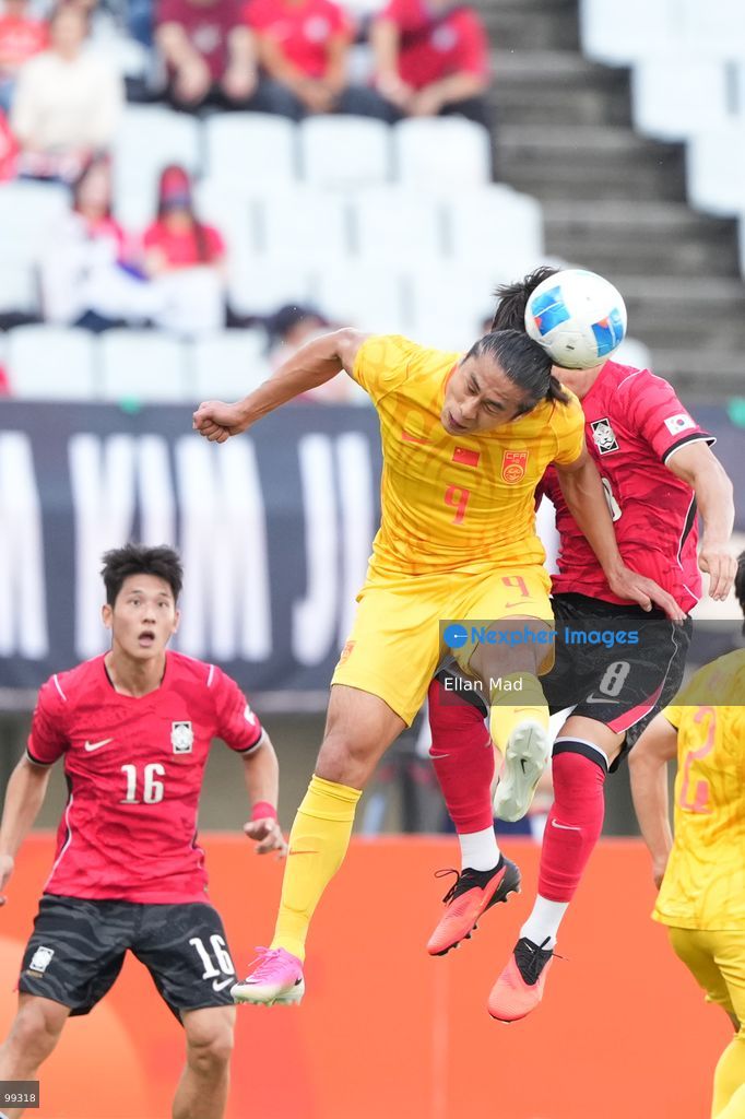 South Korean footballer Lee Seung-won and chinese footballer Zhang Yuning during a football match between South Korea and China at the 2026 asia games on September 30, 2026 in Nagai Stadium, Osaka, Japan (Photo by Ellan Mad/Nexpher Images)