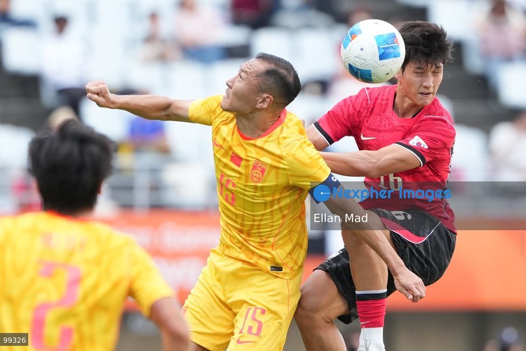 South Korean footballer Choi Seok-hyun and chinese footballer Wu Xi during a football match between South Korea and China at the 2026 asia games on September 30, 2026 in Nagai Stadium, Osaka, Japan (Photo by Ellan Mad/Nexpher Images)