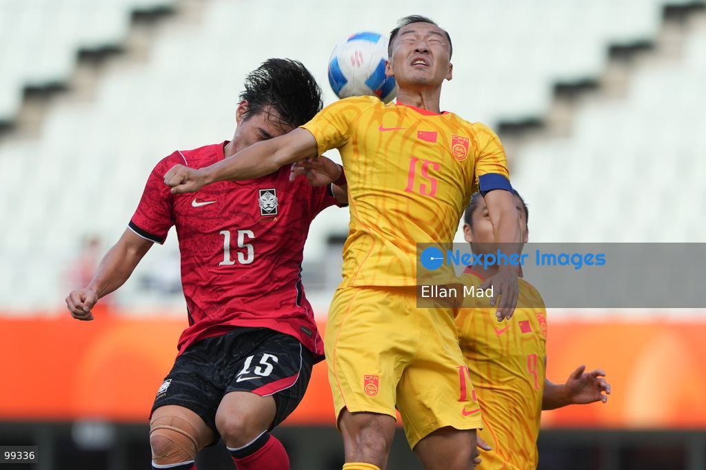 TOP PICS - South Korean footballer Hwang Do-yun and chinese footballer Wu Xi during a football match between South Korea and China at the 2026 asia games on September 30, 2026 in Nagai Stadium, Osaka, Japan (Photo by Ellan Mad/Nexpher Images)