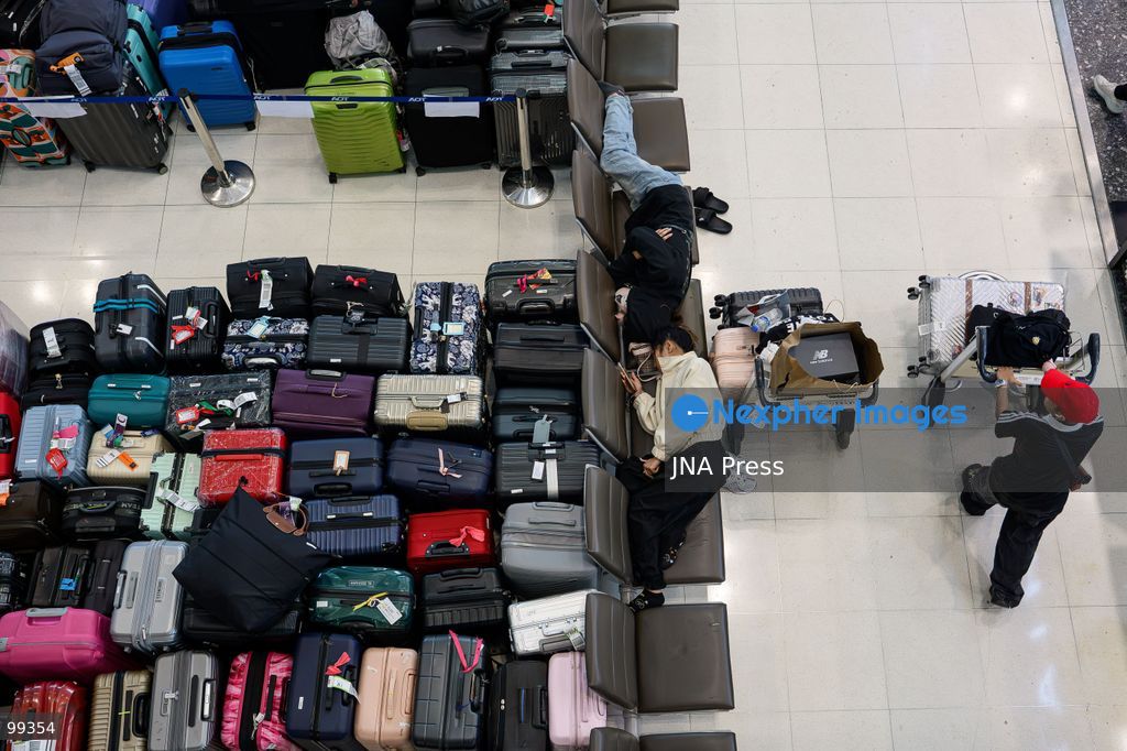 SAMUT PRAKAN, THAILAND, SEPTEMBER 30, 2026: Delayed baggage accumulates at Suvarnabhumi Airport in Samut Prakan as flooding disrupts ground-handling operations and affects the movement of airport personnel. Thousands of pieces of luggage have been left awaiting processing and collection as airport authorities and airlines work to clear the backlog and return baggage to affected passengers. Photo by Watsawat Koktabtim / JNA Press (Photo by Watsawat Koktabtim/JNA Press via Nexpher Images)