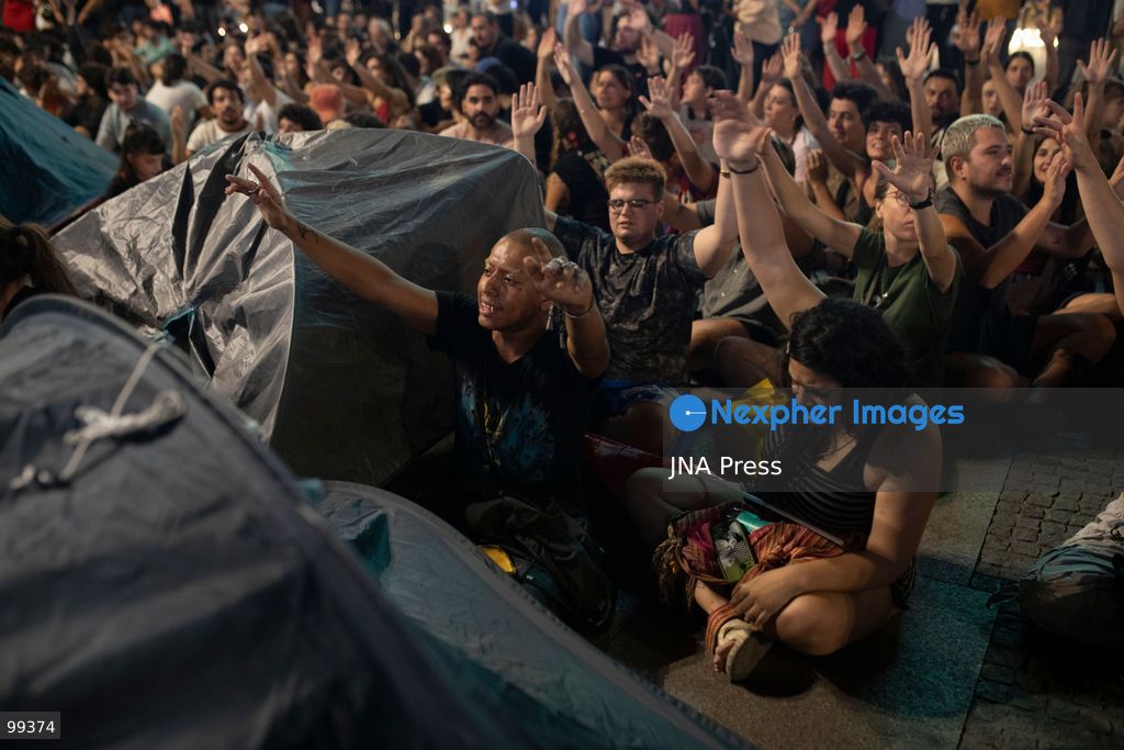 MADRID, SPAIN, SEPTEMBER 30, 2026: Housing activists continue their encampment at Puerta del Sol following a mass demonstration against Madrid's housing crisis. Participants have drawn comparisons between the current protest movement, referred to by activists as "26-S," and the 15-M Indignados movement that occupied the square 15 years earlier. Organizers, however, say the current mobilization has different political and organizational goals and remains focused on demands for affordable housing and stronger protections against evictions. (Photo by Edu Leon/JNA Press via Nexpher Images)