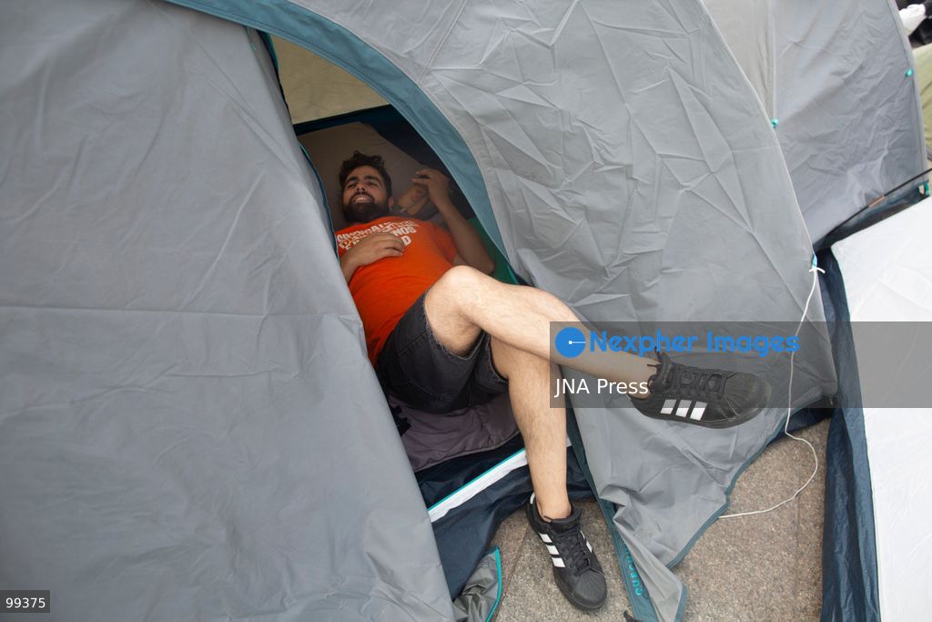 MADRID, SPAIN, SEPTEMBER 30, 2026: Housing activists continue their encampment at Puerta del Sol following a mass demonstration against Madrid's housing crisis. Participants have drawn comparisons between the current protest movement, referred to by activists as "26-S," and the 15-M Indignados movement that occupied the square 15 years earlier. Organizers, however, say the current mobilization has different political and organizational goals and remains focused on demands for affordable housing and stronger protections against evictions. (Photo by Edu Leon/JNA Press via Nexpher Images)