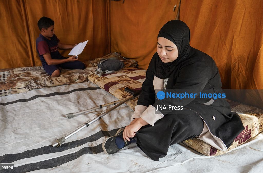NUSEIRAT, GAZA STRIP, SEPTEMBER 30, 2026: Sixteen-year-old Malak al-Ghoul trains and plays football while living displaced with her family in the Nuseirat refugee camp in the central Gaza Strip. Malak lost her right leg after her family's home in Hamad City was struck on March 2, 2024. Now living with her family of 10 in Nuseirat, she continues to pursue her passion for sport and plays with Palestine's amputee football team, determined to continue training and pursue her ambitions despite her injury and displacement. Photo by Ramzi Abu Amer / JNA Press. (Photo by Ramzi Abu Amer/JNA Press via Nexpher Images)