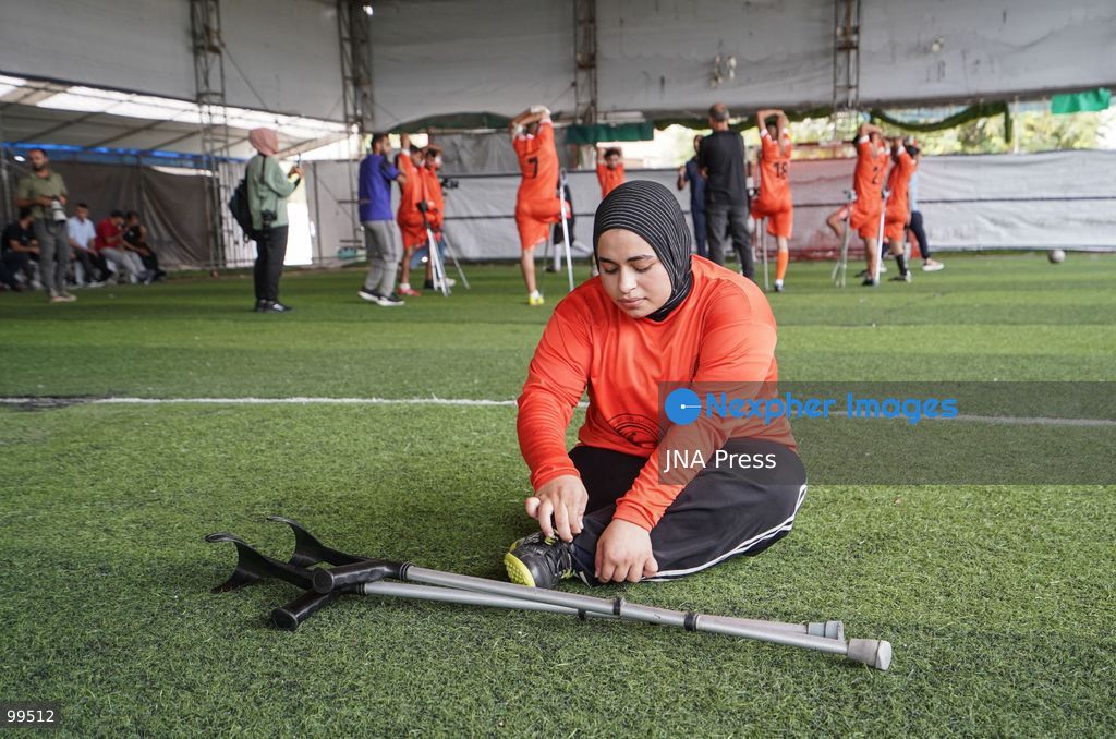 NUSEIRAT, GAZA STRIP, SEPTEMBER 30, 2026: Sixteen-year-old Malak al-Ghoul trains and plays football while living displaced with her family in the Nuseirat refugee camp in the central Gaza Strip. Malak lost her right leg after her family's home in Hamad City was struck on March 2, 2024. Now living with her family of 10 in Nuseirat, she continues to pursue her passion for sport and plays with Palestine's amputee football team, determined to continue training and pursue her ambitions despite her injury and displacement. Photo by Ramzi Abu Amer / JNA Press. (Photo by Ramzi Abu Amer/JNA Press via Nexpher Images)