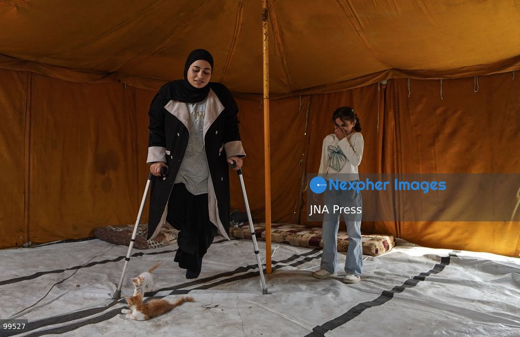 NUSEIRAT, GAZA STRIP, SEPTEMBER 30, 2026: Sixteen-year-old Malak al-Ghoul trains and plays football while living displaced with her family in the Nuseirat refugee camp in the central Gaza Strip. Malak lost her right leg after her family's home in Hamad City was struck on March 2, 2024. Now living with her family of 10 in Nuseirat, she continues to pursue her passion for sport and plays with Palestine's amputee football team, determined to continue training and pursue her ambitions despite her injury and displacement. Photo by Ramzi Abu Amer / JNA Press. (Photo by Ramzi Abu Amer/JNA Press via Nexpher Images)