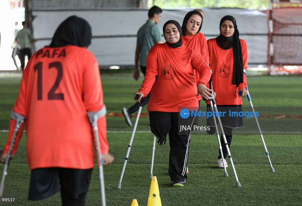 NUSEIRAT, GAZA STRIP, SEPTEMBER 30, 2026: Sixteen-year-old Malak al-Ghoul trains and plays football while living displaced with her family in the Nuseirat refugee camp in the central Gaza Strip. Malak lost her right leg after her family's home in Hamad City was struck on March 2, 2024. Now living with her family of 10 in Nuseirat, she continues to pursue her passion for sport and plays with Palestine's amputee football team, determined to continue training and pursue her ambitions despite her injury and displacement. Photo by Ramzi Abu Amer / JNA Press. (Photo by Ramzi Abu Amer/JNA Press via Nexpher Images)