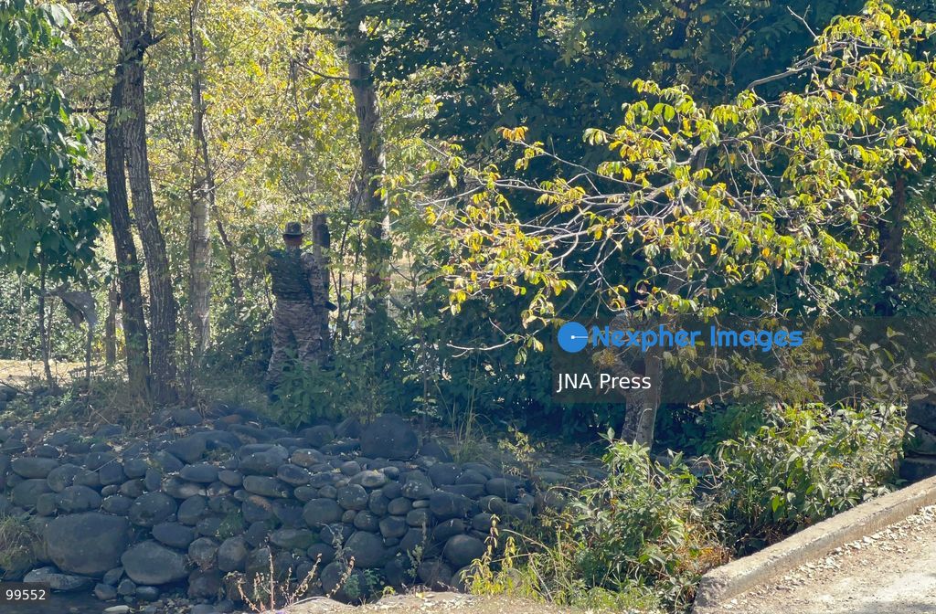 BUDGAM, KASHMIR, INDIA, SEPTEMBER 30, 2026: An armed security personnel member stands along a road during a security operation in the Korag area near Yousmarg in central Kashmir's Budgam district. Indian security forces launched a joint search operation following specific intelligence about the presence of militants in the area. The Indian Army said a Pakistan-based Lashkar-e-Taiba militant, identified as Mohammad Asif alias Hashim Moosa, was killed during an exchange of fire, while security forces continued searches in the surrounding area. Photo by Umer Qadir / JNA Press. (Photo by Umer Qadir/JNA Press via Nexpher Images)
