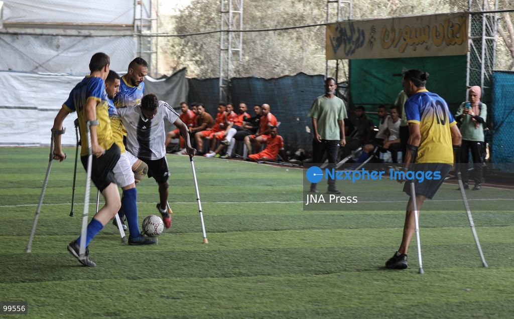 CENTRAL GAZA STRIP, SEPTEMBER 30, 2026: Palestinian amputee athletes take part in a football match in the central Gaza Strip as part of a humanitarian initiative supporting athletes who lost limbs during the war. The initiative aims to promote social inclusion and provide participants with an opportunity to return to sporting activities and rebuild their connection with everyday life through football. Photo by Ramzi Abu Amer / JNA Press (Photo by Ramzi Abu Amer/JNA Press via Nexpher Images)