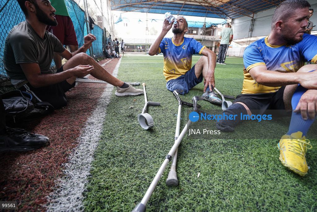 CENTRAL GAZA STRIP, SEPTEMBER 30, 2026: Palestinian amputee athletes take part in a football match in the central Gaza Strip as part of a humanitarian initiative supporting athletes who lost limbs during the war. The initiative aims to promote social inclusion and provide participants with an opportunity to return to sporting activities and rebuild their connection with everyday life through football. Photo by Ramzi Abu Amer / JNA Press (Photo by Ramzi Abu Amer/JNA Press via Nexpher Images)