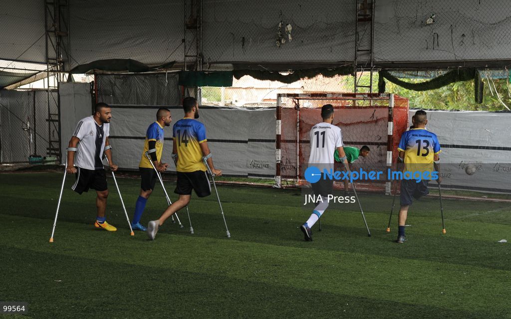 CENTRAL GAZA STRIP, SEPTEMBER 30, 2026: Palestinian amputee athletes take part in a football match in the central Gaza Strip as part of a humanitarian initiative supporting athletes who lost limbs during the war. The initiative aims to promote social inclusion and provide participants with an opportunity to return to sporting activities and rebuild their connection with everyday life through football. Photo by Ramzi Abu Amer / JNA Press (Photo by Ramzi Abu Amer/JNA Press via Nexpher Images)
