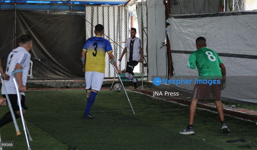 CENTRAL GAZA STRIP, SEPTEMBER 30, 2026: Palestinian amputee athletes take part in a football match in the central Gaza Strip as part of a humanitarian initiative supporting athletes who lost limbs during the war. The initiative aims to promote social inclusion and provide participants with an opportunity to return to sporting activities and rebuild their connection with everyday life through football. Photo by Ramzi Abu Amer / JNA Press (Photo by Ramzi Abu Amer/JNA Press via Nexpher Images)