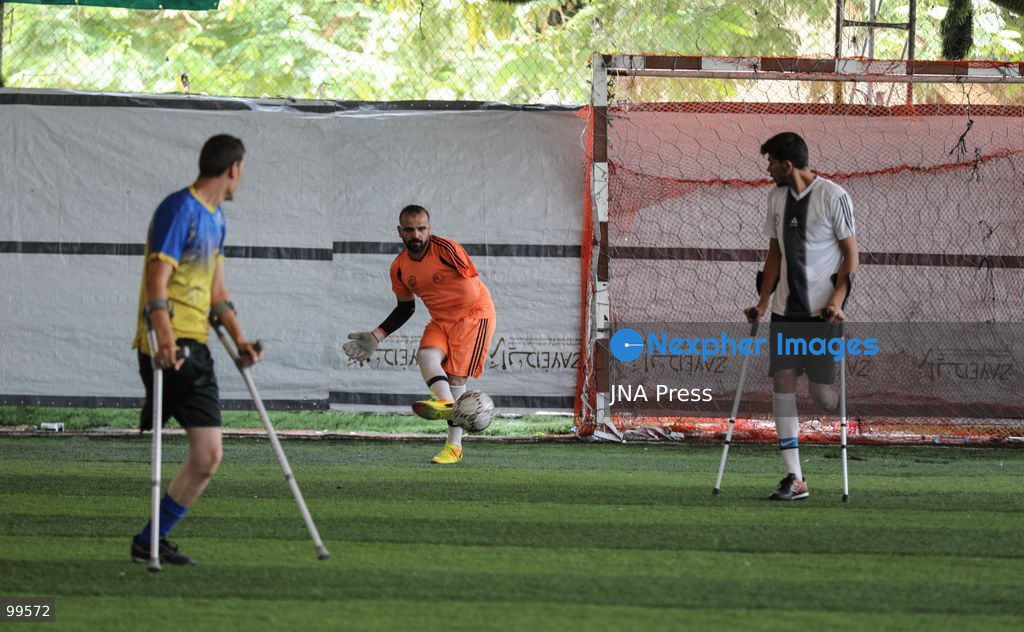 CENTRAL GAZA STRIP, SEPTEMBER 30, 2026: Palestinian amputee athletes take part in a football match in the central Gaza Strip as part of a humanitarian initiative supporting athletes who lost limbs during the war. The initiative aims to promote social inclusion and provide participants with an opportunity to return to sporting activities and rebuild their connection with everyday life through football. Photo by Ramzi Abu Amer / JNA Press (Photo by Ramzi Abu Amer/JNA Press via Nexpher Images)