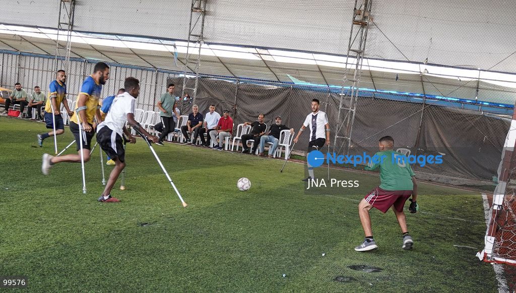 CENTRAL GAZA STRIP, SEPTEMBER 30, 2026: Palestinian amputee athletes take part in a football match in the central Gaza Strip as part of a humanitarian initiative supporting athletes who lost limbs during the war. The initiative aims to promote social inclusion and provide participants with an opportunity to return to sporting activities and rebuild their connection with everyday life through football. Photo by Ramzi Abu Amer / JNA Press (Photo by Ramzi Abu Amer/JNA Press via Nexpher Images)