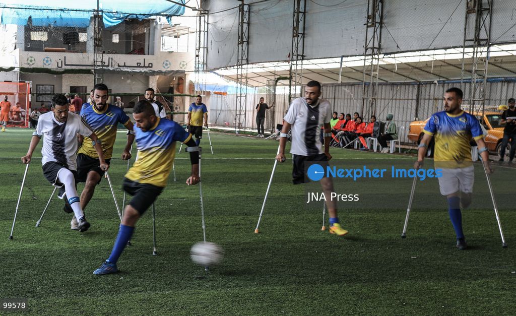 CENTRAL GAZA STRIP, SEPTEMBER 30, 2026: Palestinian amputee athletes take part in a football match in the central Gaza Strip as part of a humanitarian initiative supporting athletes who lost limbs during the war. The initiative aims to promote social inclusion and provide participants with an opportunity to return to sporting activities and rebuild their connection with everyday life through football. Photo by Ramzi Abu Amer / JNA Press (Photo by Ramzi Abu Amer/JNA Press via Nexpher Images)