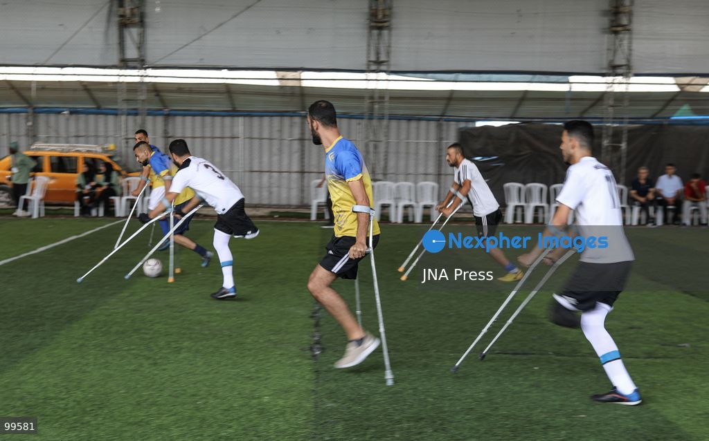 CENTRAL GAZA STRIP, SEPTEMBER 30, 2026: Palestinian amputee athletes take part in a football match in the central Gaza Strip as part of a humanitarian initiative supporting athletes who lost limbs during the war. The initiative aims to promote social inclusion and provide participants with an opportunity to return to sporting activities and rebuild their connection with everyday life through football. Photo by Ramzi Abu Amer / JNA Press (Photo by Ramzi Abu Amer/JNA Press via Nexpher Images)