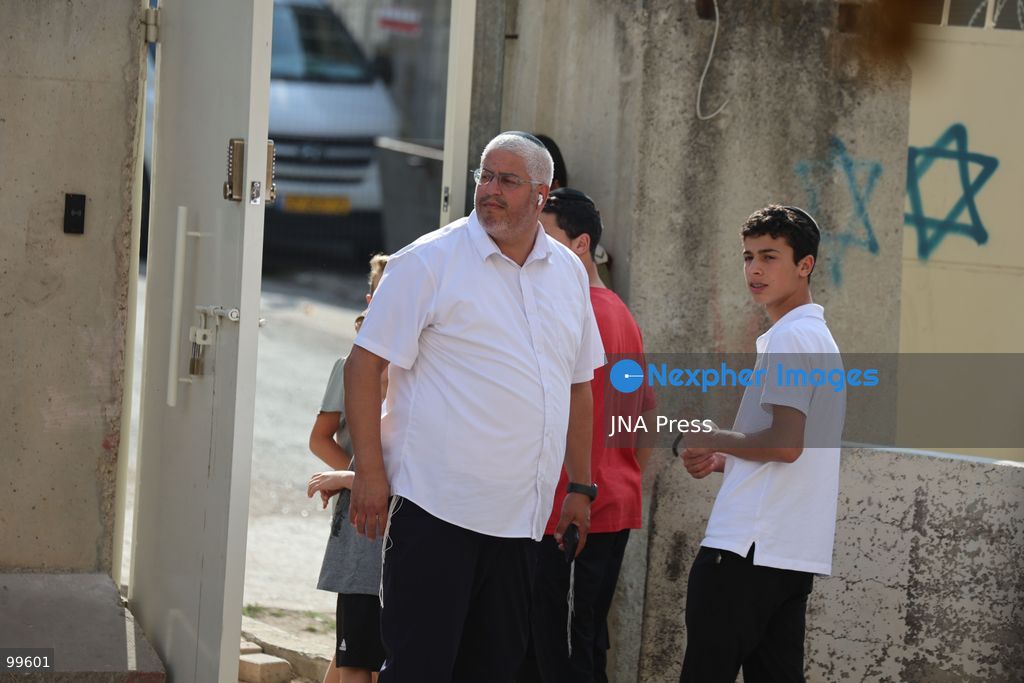 HEBRON, OCCUPIED WEST BANK, SEPTEMBER 30, 2026: Israeli settlers walk through Hebron's Old City under the protection of Israeli forces during celebrations for the Jewish holiday of Sukkot. Israeli forces maintained heightened security measures and movement restrictions around the Old City and the Ibrahimi Mosque during the holiday period. Photo by Mosab Shawer / JNA Press. (Photo by Mosab shawer/JNA Press via Nexpher Images)