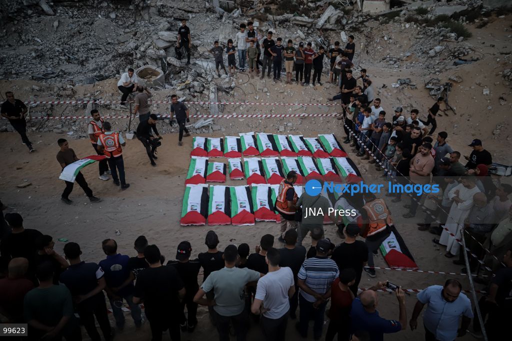 GAZA CITY, GAZA STRIP, SEPTEMBER 30, 2026: Palestinians attend a farewell viewing for 105 people who were killed in an Israeli bombardment on October 25, 2023, during the war in the Gaza Strip. The ceremony was held nearly three years after their deaths. Photo by Mohammed M. Skaik / JNA Press. (Photo by Mohammed M Skaik/JNA Press via Nexpher Images)