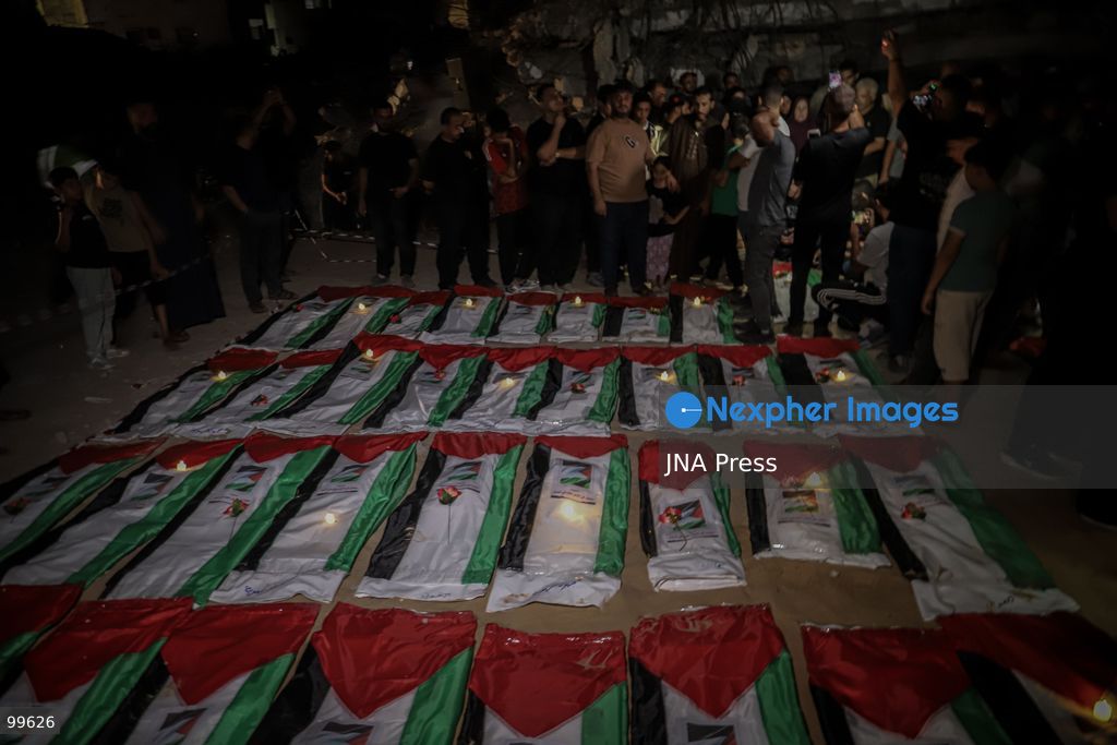 GAZA CITY, GAZA STRIP, SEPTEMBER 30, 2026: Palestinians attend a farewell viewing for 105 people who were killed in an Israeli bombardment on October 25, 2023, during the war in the Gaza Strip. The ceremony was held nearly three years after their deaths. Photo by Mohammed M. Skaik / JNA Press. (Photo by Mohammed M Skaik/JNA Press via Nexpher Images)