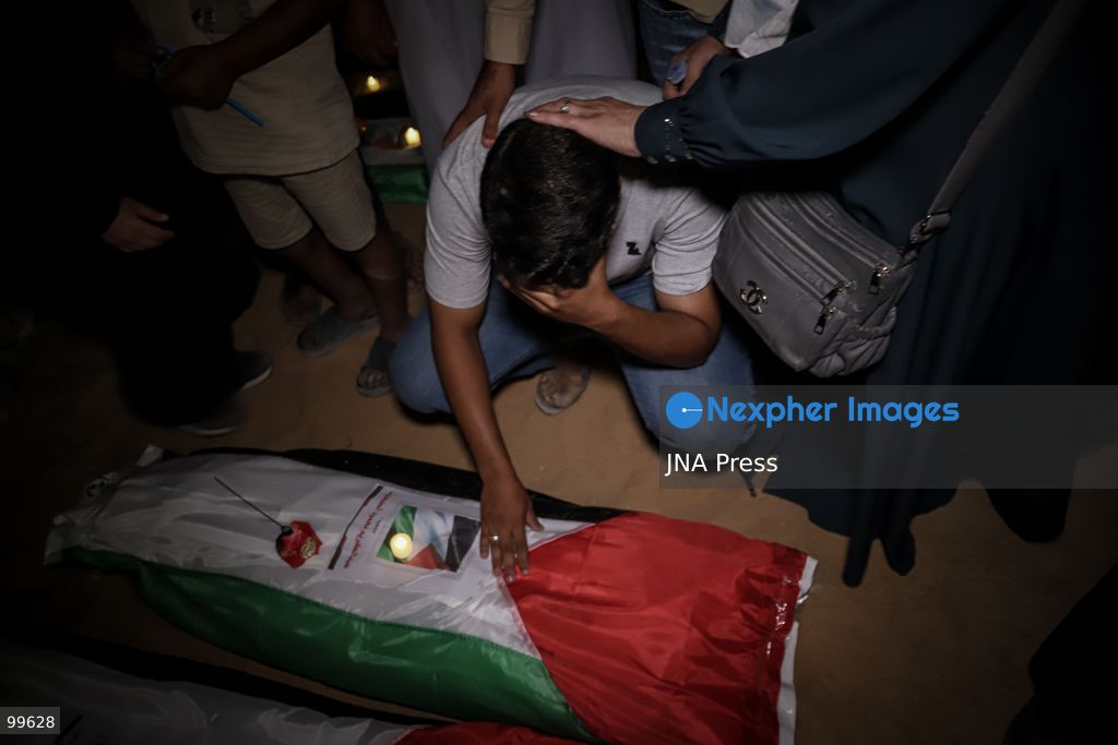GAZA CITY, GAZA STRIP, SEPTEMBER 30, 2026: Palestinians attend a farewell viewing for 105 people who were killed in an Israeli bombardment on October 25, 2023, during the war in the Gaza Strip. The ceremony was held nearly three years after their deaths. Photo by Mohammed M. Skaik / JNA Press. (Photo by Mohammed M Skaik/JNA Press via Nexpher Images)