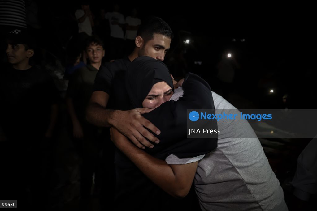 GAZA CITY, GAZA STRIP, SEPTEMBER 30, 2026: Palestinians attend a farewell viewing for 105 people who were killed in an Israeli bombardment on October 25, 2023, during the war in the Gaza Strip. The ceremony was held nearly three years after their deaths. Photo by Mohammed M. Skaik / JNA Press. (Photo by Mohammed M Skaik/JNA Press via Nexpher Images)