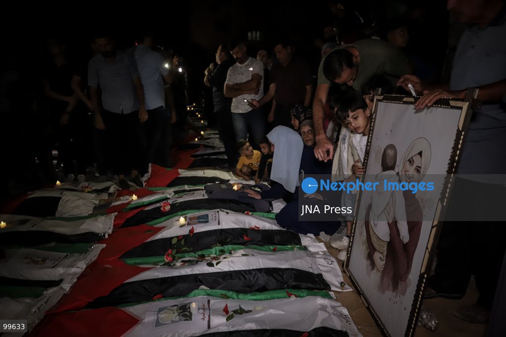 GAZA CITY, GAZA STRIP, SEPTEMBER 30, 2026: Palestinians attend a farewell viewing for 105 people who were killed in an Israeli bombardment on October 25, 2023, during the war in the Gaza Strip. The ceremony was held nearly three years after their deaths. Photo by Mohammed M. Skaik / JNA Press. (Photo by Mohammed M Skaik/JNA Press via Nexpher Images)