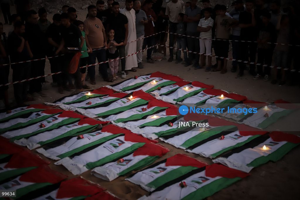 GAZA CITY, GAZA STRIP, SEPTEMBER 30, 2026: Palestinians attend a farewell viewing for 105 people who were killed in an Israeli bombardment on October 25, 2023, during the war in the Gaza Strip. The ceremony was held nearly three years after their deaths. Photo by Mohammed M. Skaik / JNA Press. (Photo by Mohammed M Skaik/JNA Press via Nexpher Images)