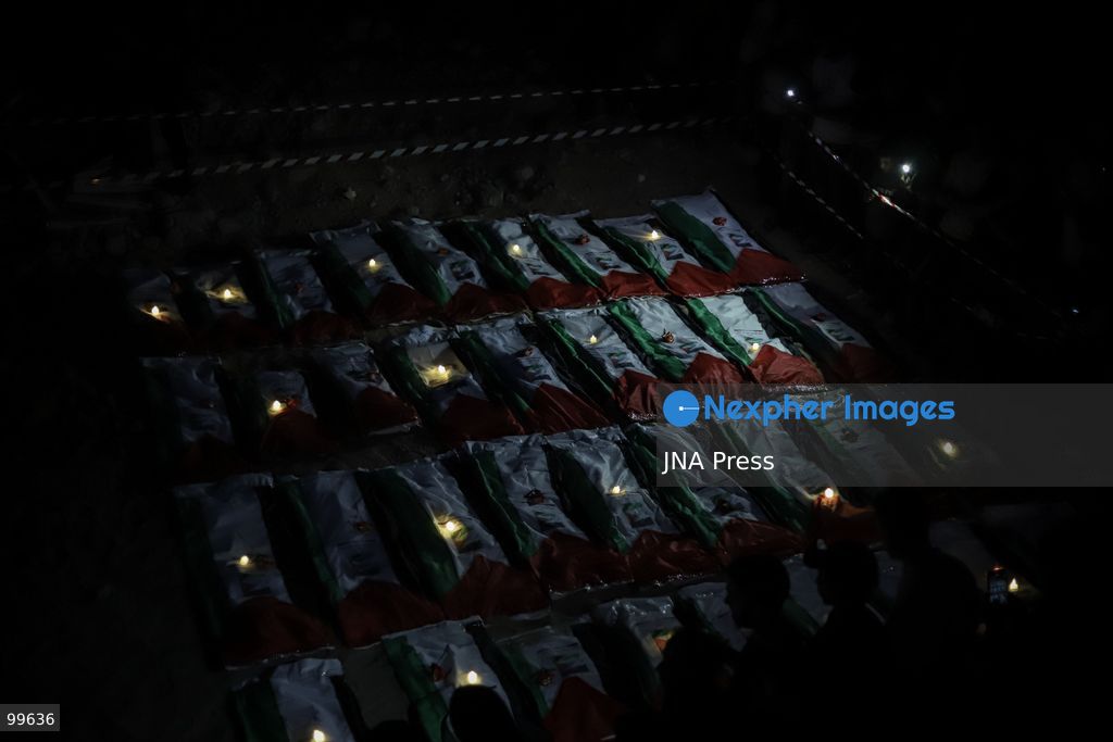 GAZA CITY, GAZA STRIP, SEPTEMBER 30, 2026: Palestinians attend a farewell viewing for 105 people who were killed in an Israeli bombardment on October 25, 2023, during the war in the Gaza Strip. The ceremony was held nearly three years after their deaths. Photo by Mohammed M. Skaik / JNA Press. (Photo by Mohammed M Skaik/JNA Press via Nexpher Images)