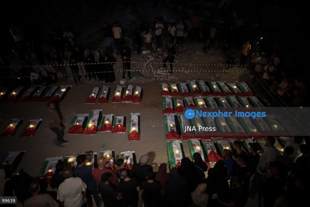 GAZA CITY, GAZA STRIP, SEPTEMBER 30, 2026: Palestinians attend a farewell viewing for 105 people who were killed in an Israeli bombardment on October 25, 2023, during the war in the Gaza Strip. The ceremony was held nearly three years after their deaths. Photo by Mohammed M. Skaik / JNA Press. (Photo by Mohammed M Skaik/JNA Press via Nexpher Images)