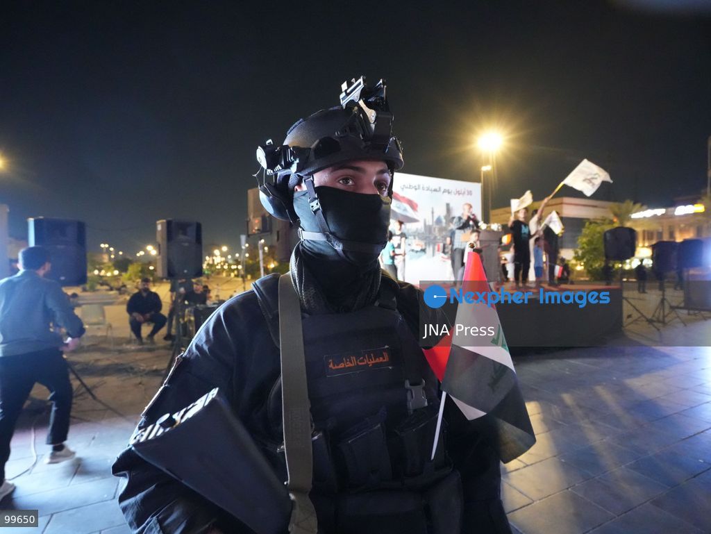 BAGHDAD, IRAQ, SEPTEMBER 30, 2026: Iraqis and members of the country's security forces gather at Tahrir Square in Baghdad during celebrations marking National Sovereignty Day following the completion of the withdrawal of US forces and the end of the US-led coalition's military mission in Iraq. Participants waved Iraqi flags and security forces took part in commemorative events as the country marked the end of the coalition's military presence. Photo by Muntazer Sahib/ JNA Press. (Photo by Muntazer Uday Sahib/JNA Press via Nexpher Images)