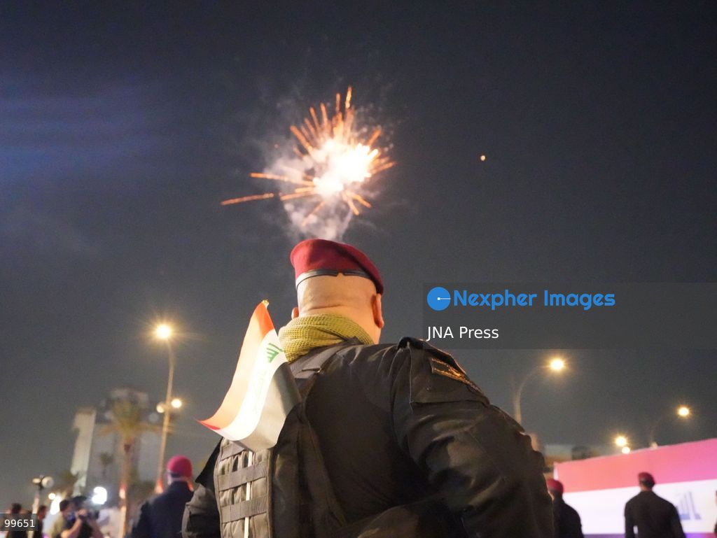 BAGHDAD, IRAQ, SEPTEMBER 30, 2026: Iraqis and members of the country's security forces gather at Tahrir Square in Baghdad during celebrations marking National Sovereignty Day following the completion of the withdrawal of US forces and the end of the US-led coalition's military mission in Iraq. Participants waved Iraqi flags and security forces took part in commemorative events as the country marked the end of the coalition's military presence. Photo by Muntazer Sahib/ JNA Press. (Photo by Muntazer Uday Sahib/JNA Press via Nexpher Images)