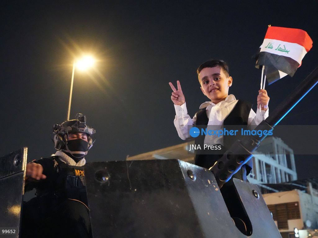 BAGHDAD, IRAQ, SEPTEMBER 30, 2026: Iraqis and members of the country's security forces gather at Tahrir Square in Baghdad during celebrations marking National Sovereignty Day following the completion of the withdrawal of US forces and the end of the US-led coalition's military mission in Iraq. Participants waved Iraqi flags and security forces took part in commemorative events as the country marked the end of the coalition's military presence. Photo by Muntazer Sahib/ JNA Press. (Photo by Muntazer Uday Sahib/JNA Press via Nexpher Images)