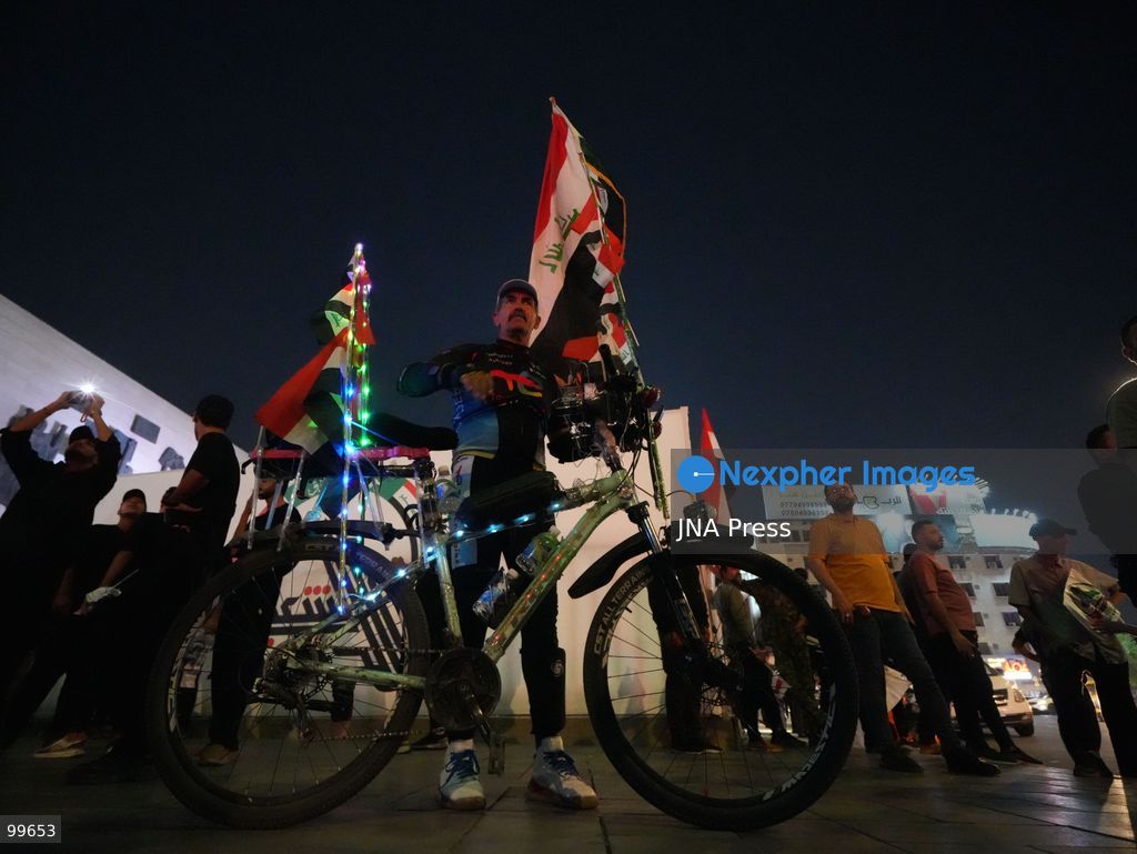 BAGHDAD, IRAQ, SEPTEMBER 30, 2026: Iraqis and members of the country's security forces gather at Tahrir Square in Baghdad during celebrations marking National Sovereignty Day following the completion of the withdrawal of US forces and the end of the US-led coalition's military mission in Iraq. Participants waved Iraqi flags and security forces took part in commemorative events as the country marked the end of the coalition's military presence. Photo by Muntazer Sahib/ JNA Press. (Photo by Muntazer Uday Sahib/JNA Press via Nexpher Images)