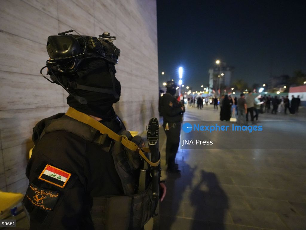 BAGHDAD, IRAQ, SEPTEMBER 30, 2026: Iraqis and members of the country's security forces gather at Tahrir Square in Baghdad during celebrations marking National Sovereignty Day following the completion of the withdrawal of US forces and the end of the US-led coalition's military mission in Iraq. Participants waved Iraqi flags and security forces took part in commemorative events as the country marked the end of the coalition's military presence. Photo by Muntazer Sahib/ JNA Press. (Photo by Muntazer Uday Sahib/JNA Press via Nexpher Images)