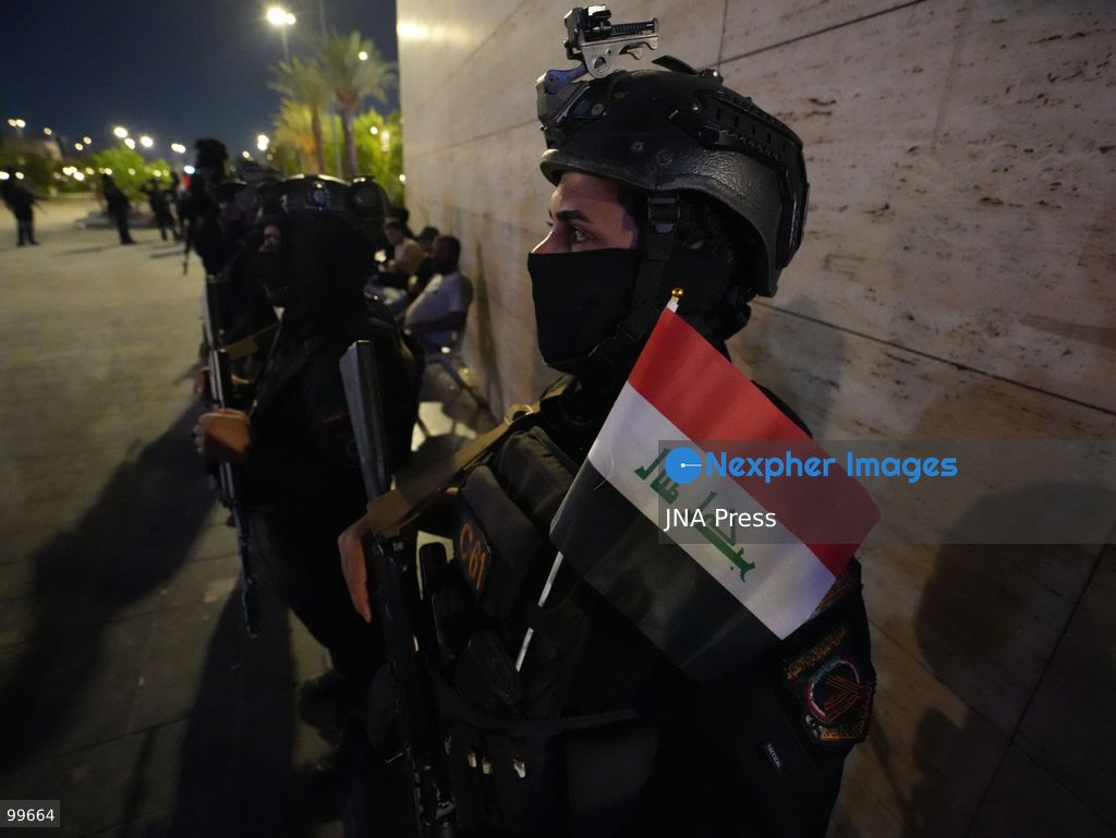 BAGHDAD, IRAQ, SEPTEMBER 30, 2026: Iraqis and members of the country's security forces gather at Tahrir Square in Baghdad during celebrations marking National Sovereignty Day following the completion of the withdrawal of US forces and the end of the US-led coalition's military mission in Iraq. Participants waved Iraqi flags and security forces took part in commemorative events as the country marked the end of the coalition's military presence. Photo by Muntazer Sahib/ JNA Press. (Photo by Muntazer Uday Sahib/JNA Press via Nexpher Images)
