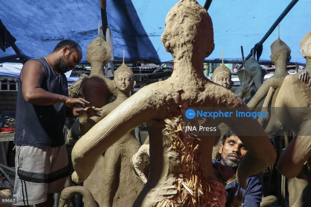 LALITPUR, NEPAL, SEPTEMBER 30, 2026: Sculptors work on clay idols of the Hindu goddess Durga in Lalitpur as preparations continue for the Dashain festival. Artisans shape the figures using clay, mud and straw ahead of celebrations for one of Nepal's most important Hindu festivals. Photo by Shankar Bhujel / JNA Press. (Photo by Shankar Bhujel/JNA Press via Nexpher Images)
