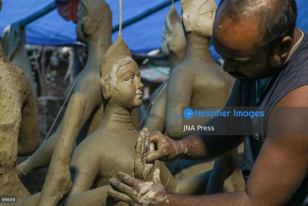 LALITPUR, NEPAL, SEPTEMBER 30, 2026: Sculptors work on clay idols of the Hindu goddess Durga in Lalitpur as preparations continue for the Dashain festival. Artisans shape the figures using clay, mud and straw ahead of celebrations for one of Nepal's most important Hindu festivals. Photo by Shankar Bhujel / JNA Press. (Photo by Shankar Bhujel/JNA Press via Nexpher Images)