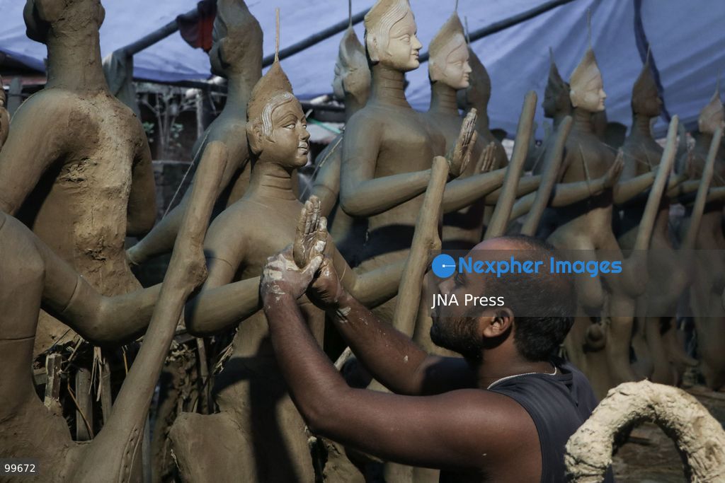 LALITPUR, NEPAL, SEPTEMBER 30, 2026: Sculptors work on clay idols of the Hindu goddess Durga in Lalitpur as preparations continue for the Dashain festival. Artisans shape the figures using clay, mud and straw ahead of celebrations for one of Nepal's most important Hindu festivals. Photo by Shankar Bhujel / JNA Press. (Photo by Shankar Bhujel/JNA Press via Nexpher Images)