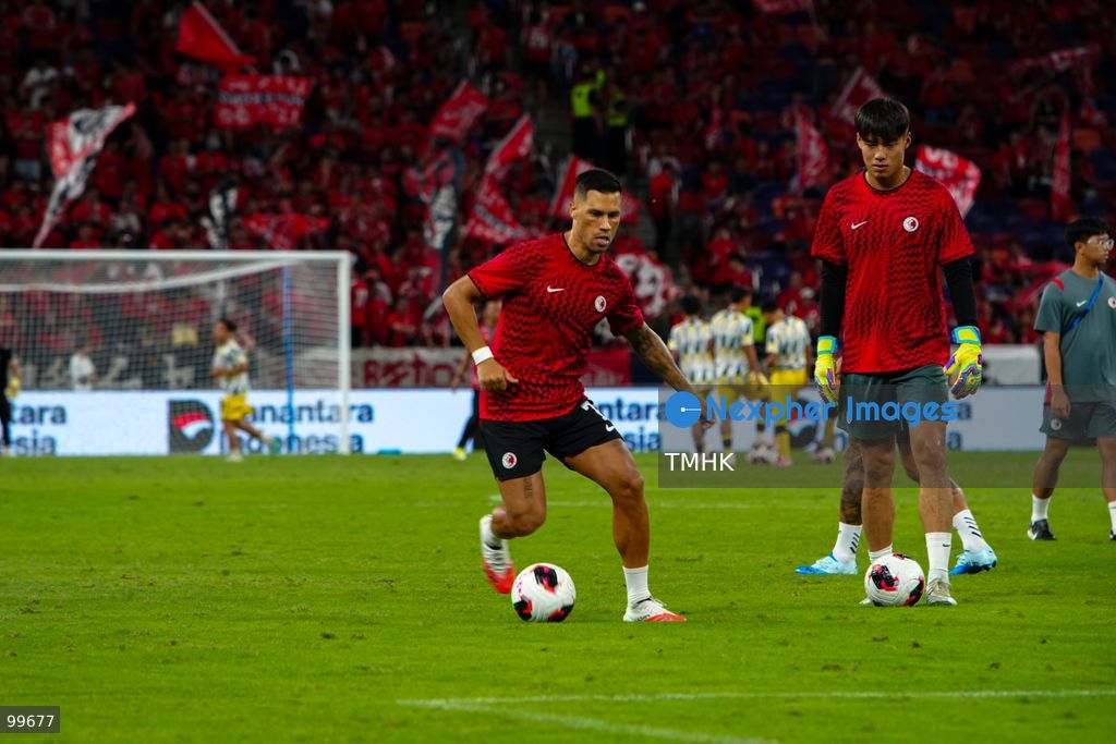 Players of Hong Kong, China conduct stretching and passing drills on the pitch during their pre-match warm-up session ahead of the FIFA ASEAN Cup Tier 2 encounter against Brunei at Kai Tak Stadium on September 30, 2026 in Hong Kong. (Photo by Zulu Lo/TMHK via Nexpher Images)