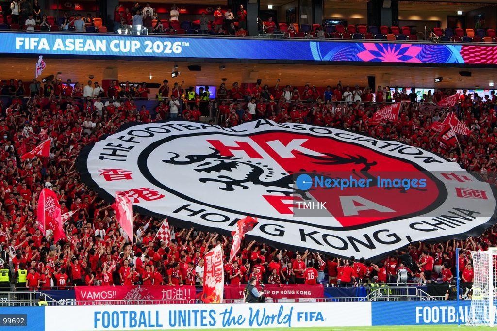 A crowd of over 20,000 spectators chant, wave red flags, and celebrate in the stands during Hong Kong, China's 2-0 victory over Brunei at the FIFA ASEAN Cup at Kai Tak Stadium on September 30, 2026 in Hong Kong. (Photo by Zulu Lo/TMHK via Nexpher Images)