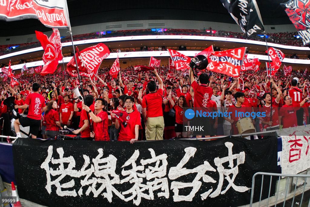 A crowd of over 20,000 spectators chant, wave red flags, and celebrate in the stands during Hong Kong, China's 2-0 victory over Brunei at the FIFA ASEAN Cup at Kai Tak Stadium on September 30, 2026 in Hong Kong. (Photo by Zulu Lo/TMHK via Nexpher Images)