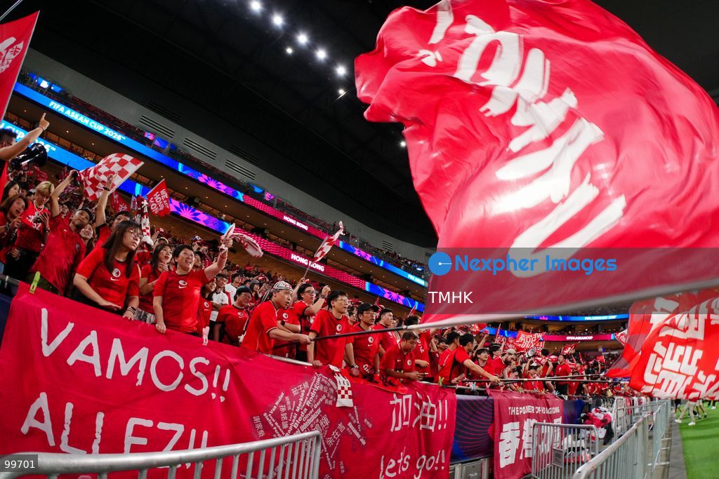 A crowd of over 20,000 spectators chant, wave red flags, and celebrate in the stands during Hong Kong, China's 2-0 victory over Brunei at the FIFA ASEAN Cup at Kai Tak Stadium on September 30, 2026 in Hong Kong. (Photo by Zulu Lo/TMHK via Nexpher Images)