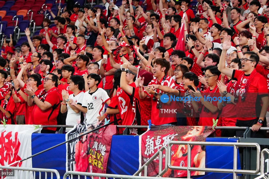 A crowd of over 20,000 spectators chant, wave red flags, and celebrate in the stands during Hong Kong, China's 2-0 victory over Brunei at the FIFA ASEAN Cup at Kai Tak Stadium on September 30, 2026 in Hong Kong. (Photo by Zulu Lo/TMHK via Nexpher Images)