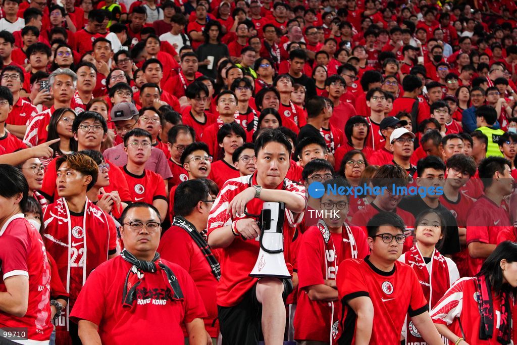 A crowd of over 20,000 spectators chant, wave red flags, and celebrate in the stands during Hong Kong, China's 2-0 victory over Brunei at the FIFA ASEAN Cup at Kai Tak Stadium on September 30, 2026 in Hong Kong. (Photo by Zulu Lo/TMHK via Nexpher Images)