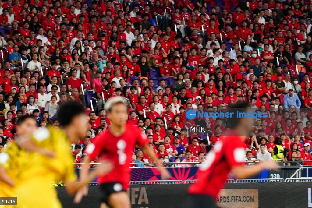 A crowd of over 20,000 spectators chant, wave red flags, and celebrate in the stands during Hong Kong, China's 2-0 victory over Brunei at the FIFA ASEAN Cup at Kai Tak Stadium on September 30, 2026 in Hong Kong. (Photo by Zulu Lo/TMHK via Nexpher Images)