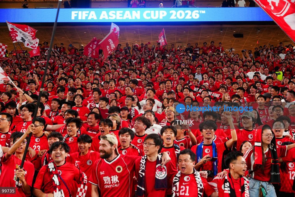 A crowd of over 20,000 spectators chant, wave red flags, and celebrate in the stands during Hong Kong, China's 2-0 victory over Brunei at the FIFA ASEAN Cup at Kai Tak Stadium on September 30, 2026 in Hong Kong. (Photo by Zulu Lo/TMHK via Nexpher Images)