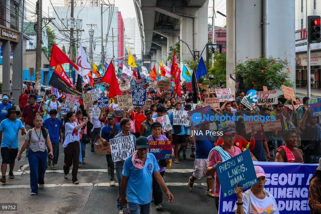 MANILA, PHILIPPINES, SEPTEMBER 30, 2026: Jeepney drivers, transport workers and supporters rally through Metro Manila during the second day of a transport strike over rising fuel prices and operating costs. Transport group PISTON called for lower fuel prices, the removal of excise tax and value-added tax on petroleum products and changes to existing oil policies, arguing that higher fuel costs have severely reduced drivers' earnings. Recent fuel price increases in the Philippines have been linked to continuing conflict and instability in the Middle East. Photo by Emman Capones/ JNA Press. (Photo by Emman Capones/JNA Press via Nexpher Images)