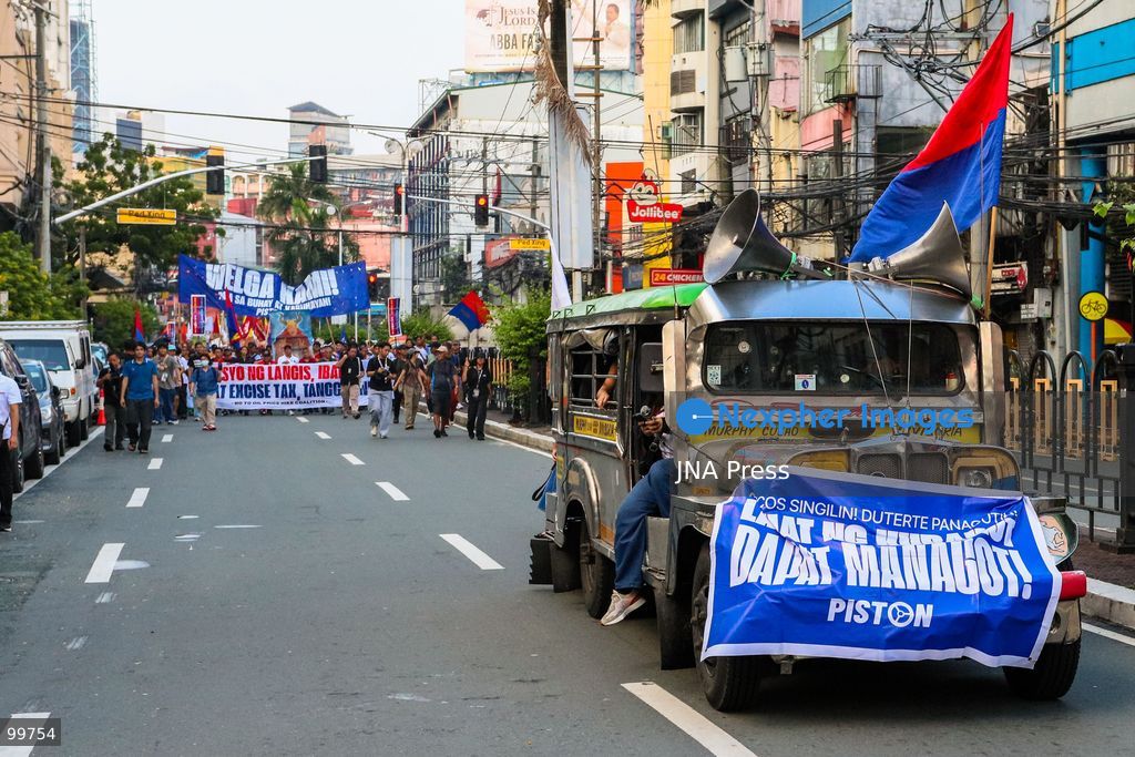 MANILA, PHILIPPINES, SEPTEMBER 30, 2026: Jeepney drivers, transport workers and supporters rally through Metro Manila during the second day of a transport strike over rising fuel prices and operating costs. Transport group PISTON called for lower fuel prices, the removal of excise tax and value-added tax on petroleum products and changes to existing oil policies, arguing that higher fuel costs have severely reduced drivers' earnings. Recent fuel price increases in the Philippines have been linked to continuing conflict and instability in the Middle East. Photo by Emman Capones/ JNA Press. (Photo by Emman Capones/JNA Press via Nexpher Images)
