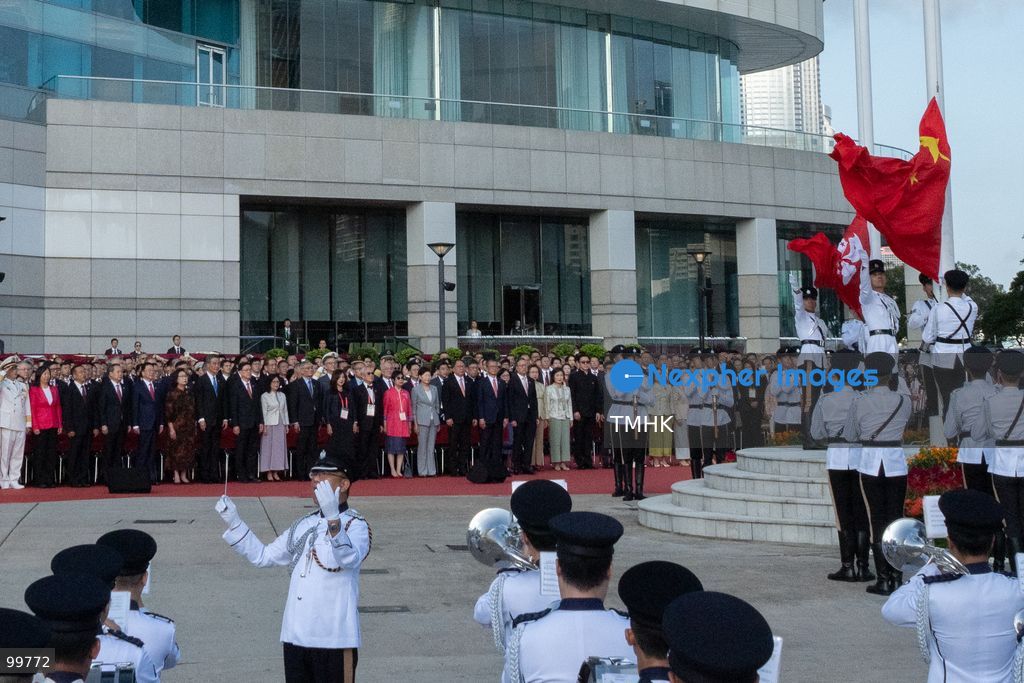 A general wide view shows the national flag of the People's Republic of China and the Hong Kong Special Administrative Region (HKSAR) regional flag being hoisted as the national anthem plays during the 77th National Day flag-raising ceremony at Golden Bauhinia Square on October 1, 2026 in Hong Kong. (Photo by Kevin Li/TMHK via Nexpher Images)